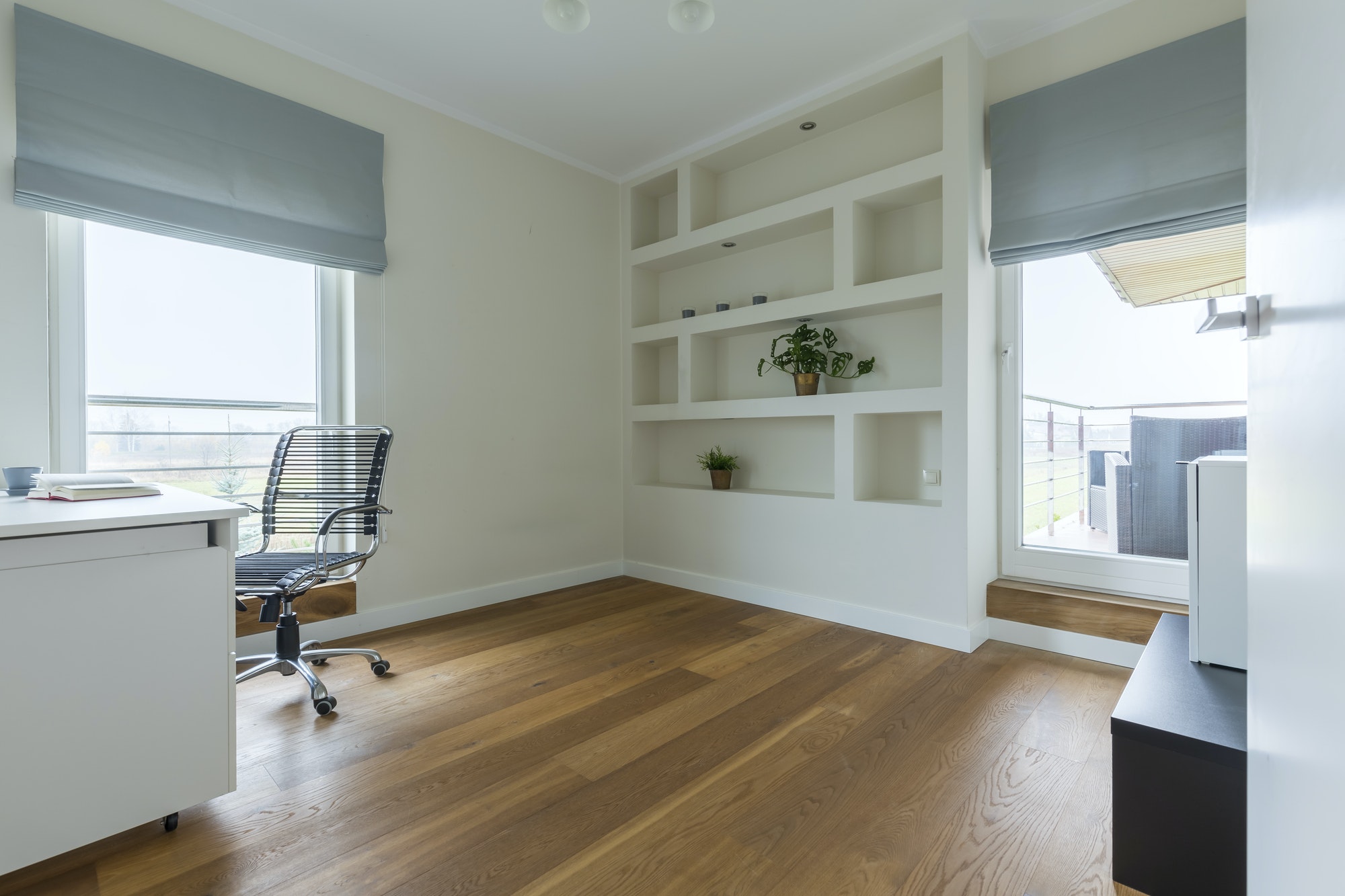 Office with wooden floor